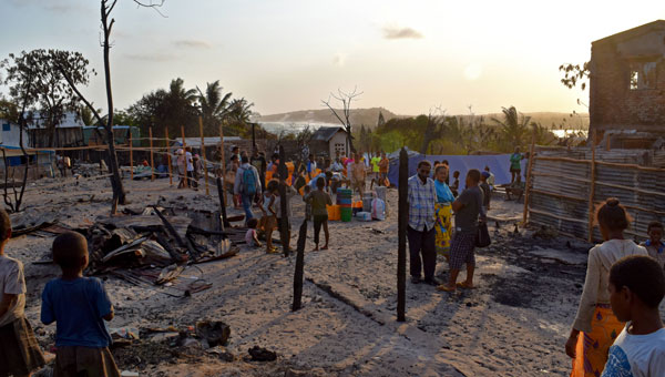 Aftermath of the fire in Ambinanikely, with destroyed homes