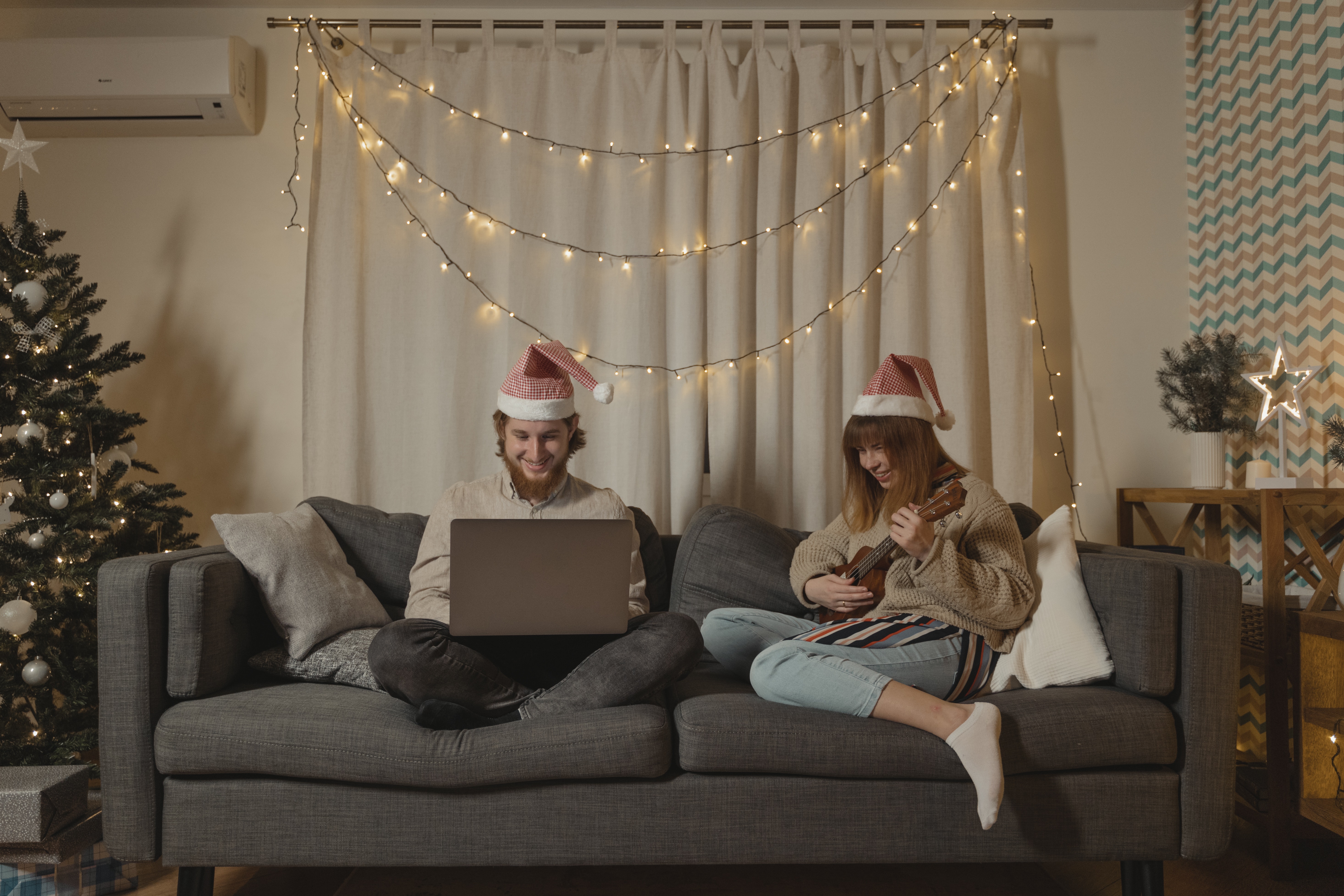 Couple on couch at Christmas