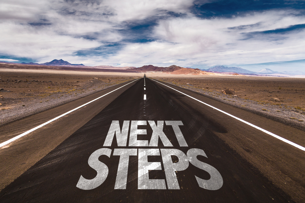 picture of a road with the words “Next Steps“