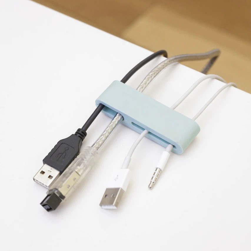 Keep all your wires stable, straight, and in one place with these Tidy Table Clips