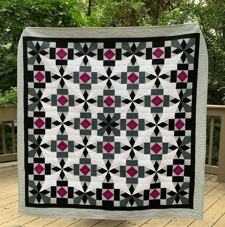 Gail Renna Island Batik Ambassador, Gail Renna, designed this quilt in EQ for an AccuQuilt challenge. She says, “We were to create and give away a project made with the AccuQuilt BOB (Block on Board) die, combined with the GO! Qube 8″ Mix and Match Block. My BOB was Hattie’s Choice and I combined it with the Susannah block.“ We love it! See more of Gail's work on her Instagram, @quilthaventhreads