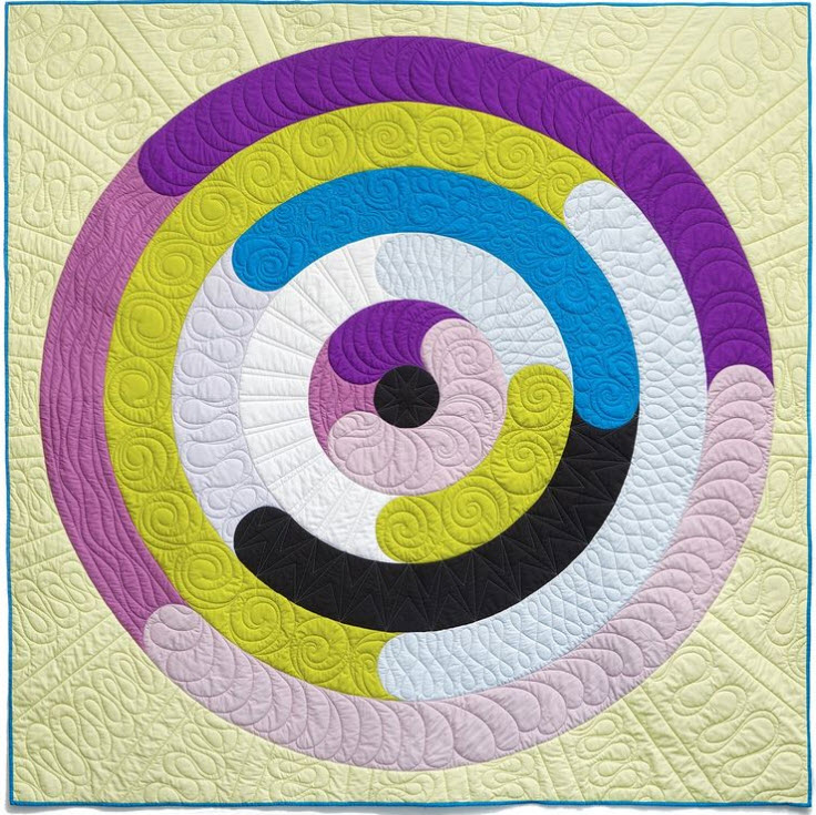 Bobbie Gentili EQ user, Bobbie Gentili, created this unique, eye-catching quilt she named “Orbital“. Before designing this quilt, she wondered, “What if we did curves within strips, but the strips are actually rings??“ That was the idea behind Orbital. See more of Bobbie's work on her Instagram, @geekybobbin or read the full Orbital story on her blog.