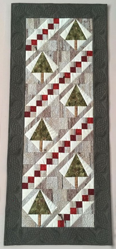 Anna Lukina What a perfect quilt for this time of year! Anna designed this in EQ8 and calls it “еловый хоровод“ which translates from Russian to Spruce Round Dance in English. Can you see yourself rockin' around these trees? We can! See more of Anna's quilts on her Instagram, @ann_vbg