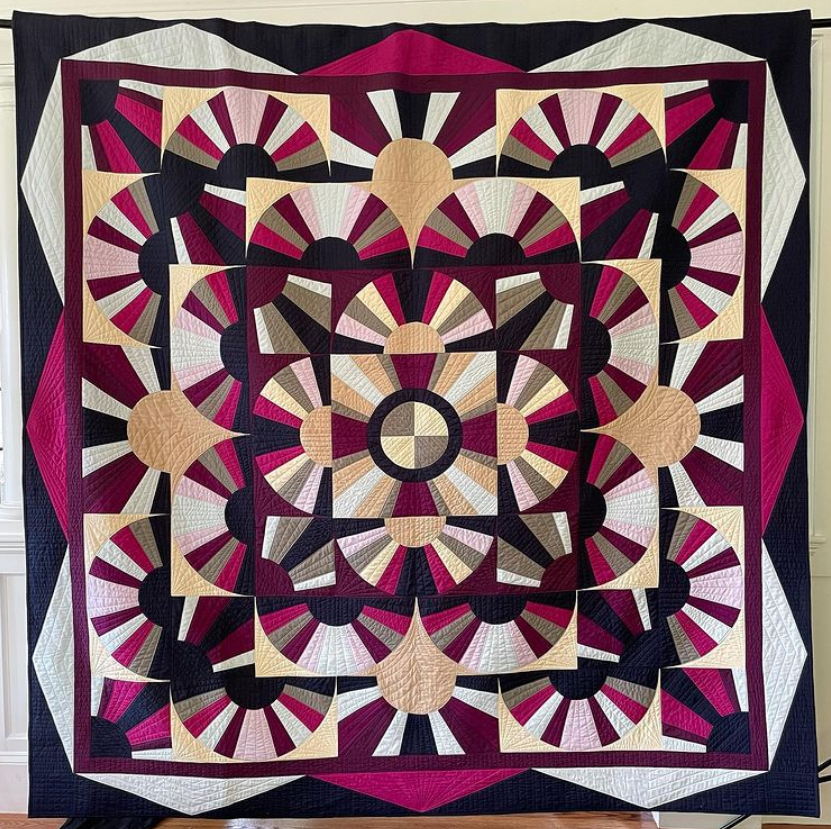 Rebecca Loren We are huge fans of this curvy quilt! Rebecca's inspiration was a 1920's quilt. We love how she turned it into something modern with EQ! Visit her Instagram, @rebeccalorenquilts to see more eye-catching quilts like this one!