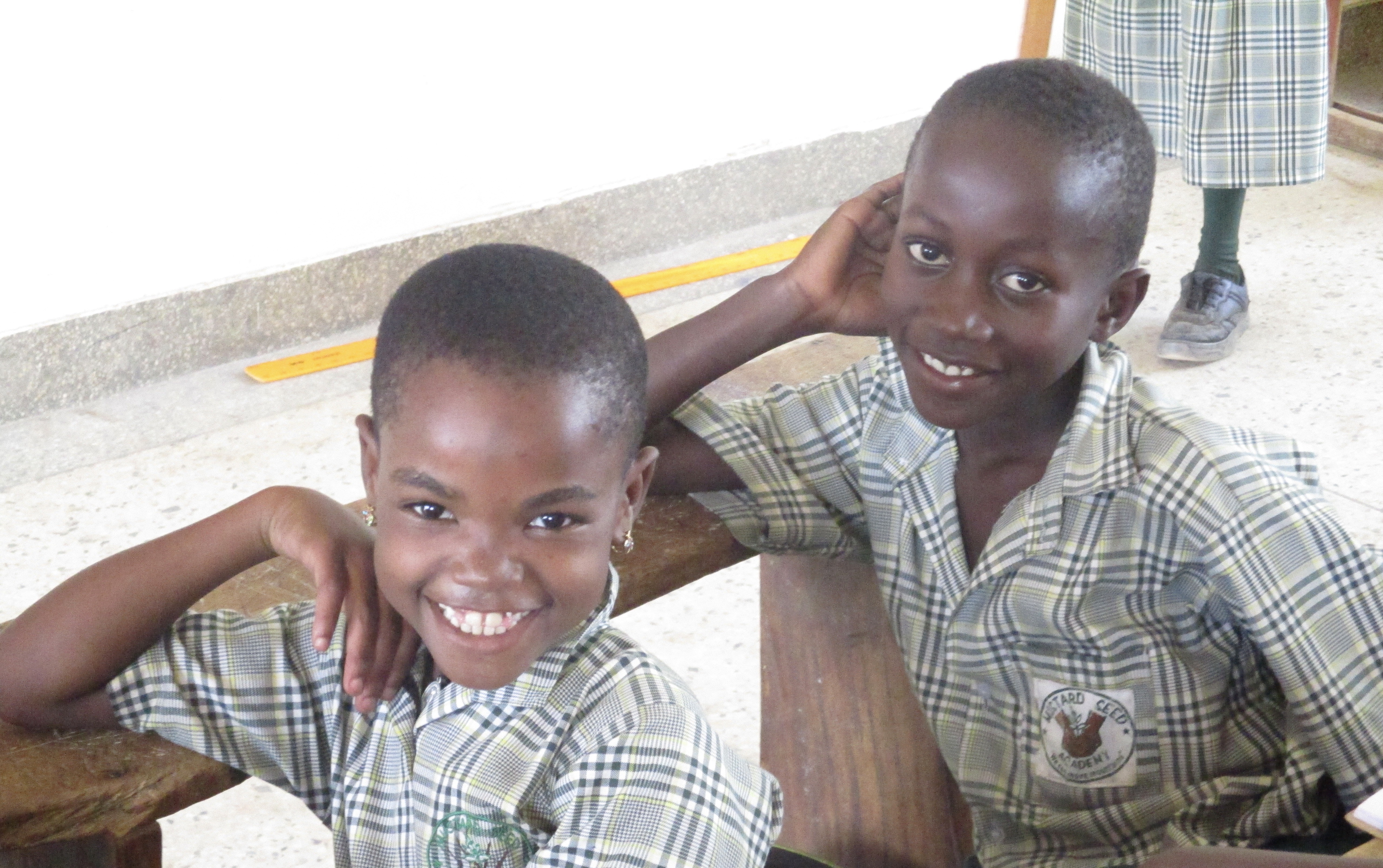 Two smiling primary school girls